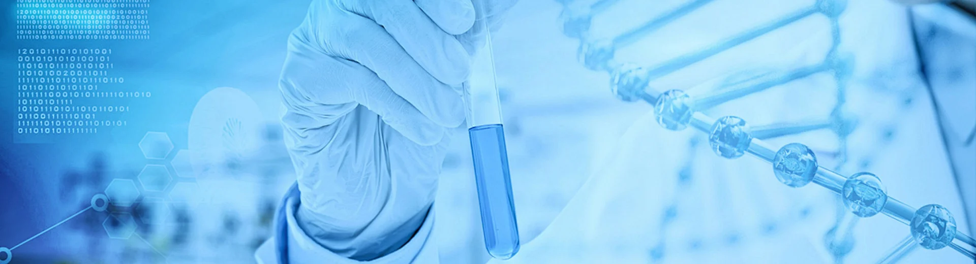 A laboratory technician holds a test tube while working in a life science laboratory.