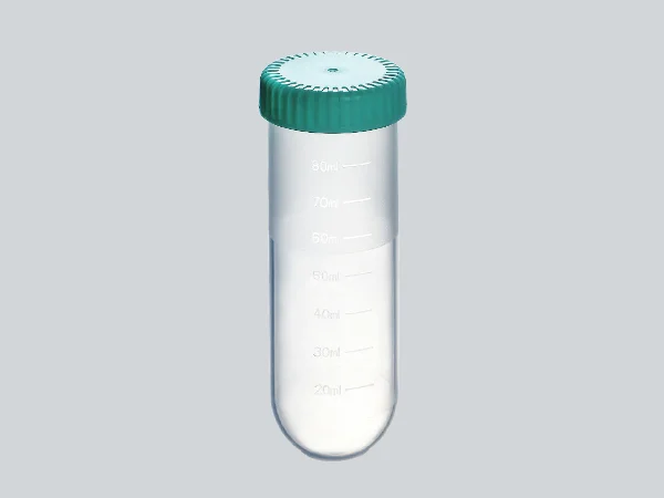 A 100 mL round bottom disposable centrifuge tube standing upright, equipped with a green screw cap.