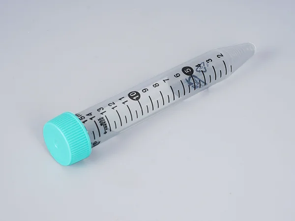 A horizontally placed 15 mL disposable centrifuge tube with a turquoise cap and black graduations.